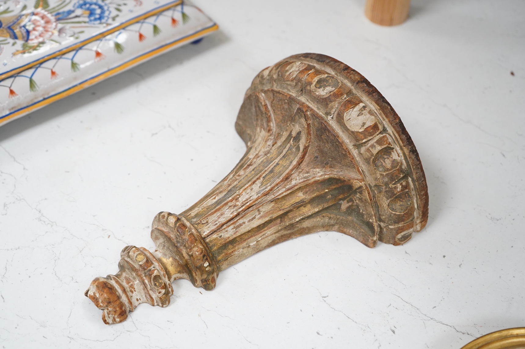 An 18th century parcel gilt carved wall bracket, 22cm high